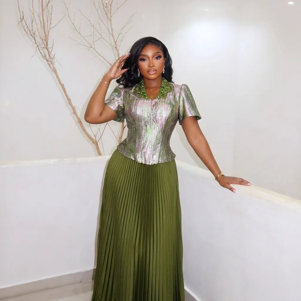 Essential Silhouette C — a Jiofit pleated crepe maxi skirt with a tailored top